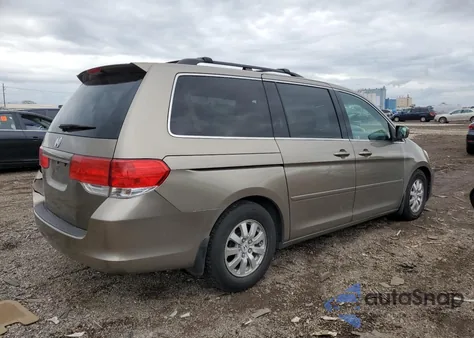 2010 Honda Odyssey Exl z USA, uszkodzony, nr VIN 5FNRL3H61AB014209